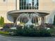 A beautiful water fountain in front of building entrance adds charm at 2828 Peachtree Nw Rd # 1002, Atlanta, GA 30305