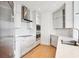 Contemporary kitchen with stainless steel appliances and white cabinets at 2828 Peachtree Nw Rd # 1002, Atlanta, GA 30305