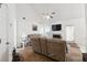Inviting living room featuring a fireplace, vaulted ceiling, and neutral décor at 403 Keys Ferry Rd, Mcdonough, GA 30252
