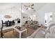 Open-concept living area flowing into the kitchen and dining space, perfect for gatherings at 403 Keys Ferry Rd, Mcdonough, GA 30252