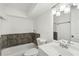 Bathroom features a tiled shower and modern vanity at 4042 Sweetbriar Ln, Forest Park, GA 30297