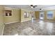 Large bonus room with ceiling fans, tile floors and access to outdoor patio at 439 Emerald Trce, Jonesboro, GA 30236