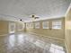 Large bonus room with ceiling fans and multiple windows for ample light at 439 Emerald Trce, Jonesboro, GA 30236