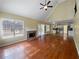 Spacious living room with fireplace, hardwood floors, and an open floor plan at 439 Emerald Trce, Jonesboro, GA 30236
