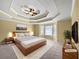 Spacious main bedroom with decorative ceiling, large window and comfortable carpeting at 439 Emerald Trce, Jonesboro, GA 30236