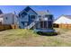 Well-maintained backyard with a trampoline, and surrounded by a wooden fence for privacy at 4570 Grove Park Nw Way, Acworth, GA 30101