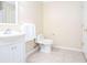 Clean and simple bathroom with a white vanity and a tiled floor at 4570 Grove Park Nw Way, Acworth, GA 30101