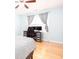 This bedroom features a ceiling fan, desk, and hardwood floors at 4570 Grove Park Nw Way, Acworth, GA 30101
