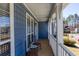 Charming outdoor deck or porch with seating to enjoy neighborhood views at 4570 Grove Park Nw Way, Acworth, GA 30101