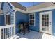 Cozy back patio with a grill and lots of light, perfect for outdoor cooking and entertaining at 4570 Grove Park Nw Way, Acworth, GA 30101