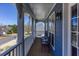 Charming porch seating area offering a relaxing space and views of the neighborhood at 4570 Grove Park Nw Way, Acworth, GA 30101