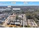 Aerial view of residential complex with home image inset and city skylines in Atlanta, GA at 5629 Kingsport Dr # 11, Atlanta, GA 30342