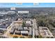 Aerial view of residential complex with home image inset and city skylines in Atlanta, GA at 5629 Kingsport Dr # 11, Atlanta, GA 30342