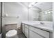 Classic bathroom featuring a large mirror, tile flooring and a shower with a sliding glass door at 5629 Kingsport Dr # 11, Atlanta, GA 30342