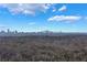 Admire the stunning city skyline from this home surrounded by natural beauty at 5629 Kingsport Dr # 11, Atlanta, GA 30342