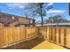 The backyard wooden deck area is perfect for relaxing or entertaining guests at 5629 Kingsport Dr # 11, Atlanta, GA 30342