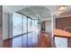 Balcony with city views, floor-to-ceiling windows, wood floors, and access to indoor living spaces at 860 Peachtree Ne St # 917, Atlanta, GA 30308