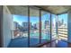 Enjoy stunning city views from this unit's private balcony overlooking city architecture and a rooftop pool at 860 Peachtree Ne St # 917, Atlanta, GA 30308