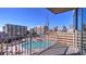 Enjoy city views from this balcony overlooking the community pool and surrounding buildings at 860 Peachtree Ne St # 917, Atlanta, GA 30308