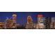 Panoramic night view of the city skyline with illuminated skyscrapers showcasing vibrant urban living at 860 Peachtree Ne St # 917, Atlanta, GA 30308