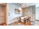 Dining room showcasing wood table, modern lighting, and unique flooring with a modern design at 860 Peachtree Ne St # 917, Atlanta, GA 30308