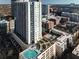 Modern high-rise with a rooftop pool and lush green area at 860 Peachtree Ne St # 917, Atlanta, GA 30308