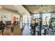 Bright and airy gym featuring modern equipment and floor to ceiling windows, ideal for health and wellness at 860 Peachtree Ne St # 917, Atlanta, GA 30308