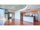 Open living area with hardwood floors, city views, and modern lighting at 860 Peachtree Ne St # 917, Atlanta, GA 30308