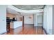 Open floor plan featuring kitchen, dining area, living room with hardwood floors and great city views at 860 Peachtree Ne St # 917, Atlanta, GA 30308