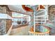 Stunning lobby with a spiral staircase, stone accents, and comfortable seating areas at 860 Peachtree Ne St # 917, Atlanta, GA 30308