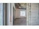 Bright main bedroom with a ceiling fan, grey carpet and an exposed concrete ceiling at 860 Peachtree Ne St # 917, Atlanta, GA 30308