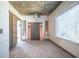 Main bedroom featuring a modern ceiling fan, sliding wood door, and bright natural light at 860 Peachtree Ne St # 917, Atlanta, GA 30308