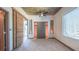Bright main bedroom featuring gray carpet, a fan, closet and natural light from the window at 860 Peachtree Ne St # 917, Atlanta, GA 30308