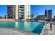 Modern apartment building with an outdoor swimming pool, offering residents a leisure and recreational amenity at 860 Peachtree Ne St # 917, Atlanta, GA 30308