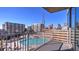 Balcony view of the rooftop pool with city skyline at 860 Peachtree Ne St # 917, Atlanta, GA 30308