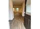 Inviting entryway with wood-look floors and view to the living room at 903 Jackson Oak Place, Villa Rica, GA 30180