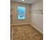 Spacious walk-in closet with shelving and a window for natural light, ideal for organization at 903 Jackson Oak Place, Villa Rica, GA 30180