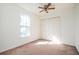 Clean and bright bedroom featuring natural light and closet at 1589 Mims Sw St, Atlanta, GA 30314