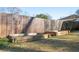 Backyard garden area showcasing raised garden beds and a wooden fence, perfect for gardening enthusiasts at 1589 Mims Sw St, Atlanta, GA 30314