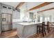 Kitchen island with a white countertop, gray cabinets, and seating for two at 1589 Mims Sw St, Atlanta, GA 30314