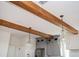 Kitchen featuring wooden ceiling beams and pendant lighting at 1589 Mims Sw St, Atlanta, GA 30314