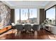 Elegant dining room with stylish lighting, floor to ceiling windows, and seating for eight at 2828 Peachtree Nw Rd # 701, Atlanta, GA 30305