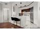 Modern kitchen with marble island, sleek white cabinets, and stainless steel appliances at 2828 Peachtree Nw Rd # 701, Atlanta, GA 30305