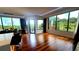 Spacious living room with gleaming hardwood floors, recessed lighting and great view from the large windows at 2828 Peachtree Nw Rd # 701, Atlanta, GA 30305