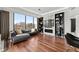 Cozy living room with comfortable seating, large windows, and fireplace at 2828 Peachtree Nw Rd # 701, Atlanta, GA 30305