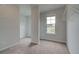 Walk-in closet with a window and ample space at 31 Homesite Cooper E Cv, Fayetteville, GA 30214