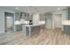 Kitchen with a large island, pendant lighting, and ample counter space at 31 Homesite Cooper E Cv, Fayetteville, GA 30214