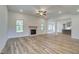Spacious living room with fireplace and hardwood floors at 31 Homesite Cooper E Cv, Fayetteville, GA 30214