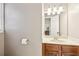 Well-lit half-bathroom with traditional sink and vanity at 2819 Saddlebrook Nw Way, Marietta, GA 30064