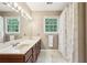 Bathroom with tile floors, and sink, and a shower curtain at 2819 Saddlebrook Nw Way, Marietta, GA 30064
